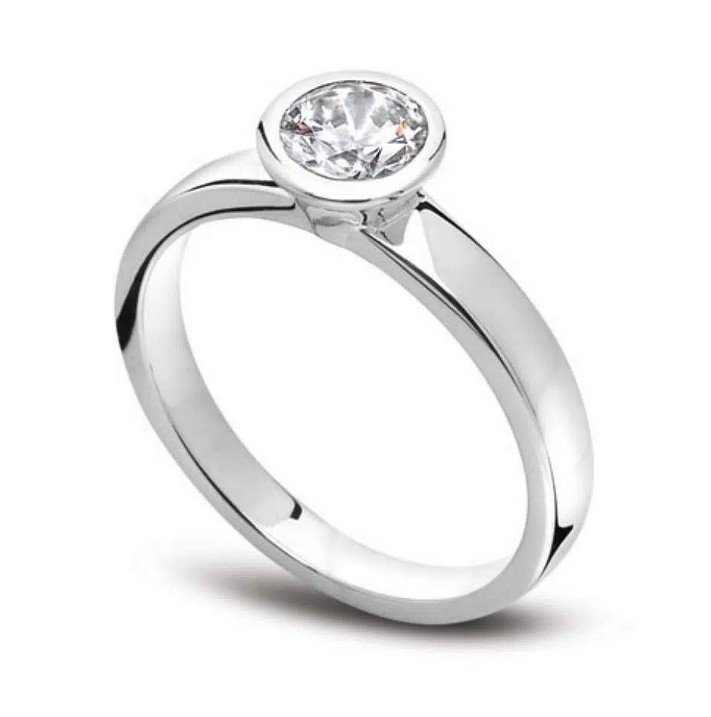 bague de fiançailles solitaire en diamant et or blanc serti clos. Modèle Unique.