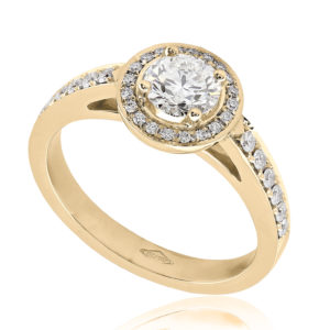 Somptueuse : Bague de fiançailles en or jaune 18k, halo épaulé de diamants. Halo et épaules serties 32 diamants G/VS total 0.16 carats.