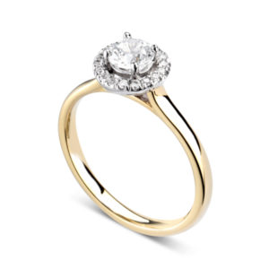 Éblouissante : Bague de fiançailles en or jaune 18k avec halo serti de diamants. Halo serti dressé 16 diamants G/VS total 0.07 carats.