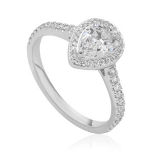 Passionnée : Bague diamant poire en or blanc 18k à halo et épaulée de diamants. Halo et épaules serties 48 diamants G/VS total 0.21 carats.