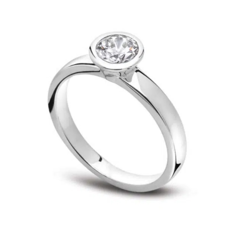 Bague de fiançailles en platine et diamant serti clos. Modèle Unique.