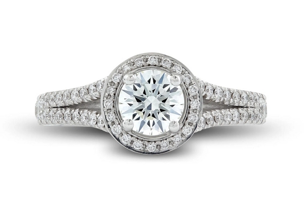 Bague de fiançailles Majestueuse en or blanc 18k présentant un halo sur anneau fendu et pavé