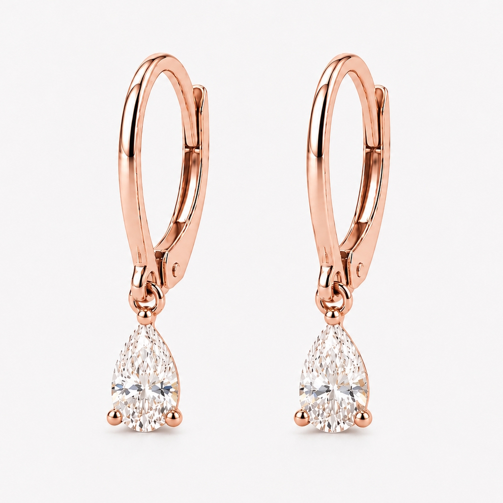 Élégantes boucles d’oreilles dormeuses en diamant taille poire et or rose 18k