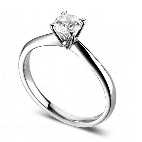 Bague de fiançailles solitaire à quatre griffes en or blanc 18k. Modèle Ravissante.